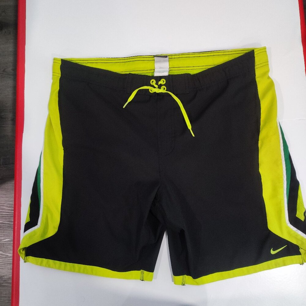 Nike dri-fit swim trunk black with green and yellow design men's size M